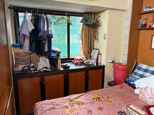 Bedroom in 2 BHK Apartment at Tulip Park CHS, Andheri East – for Rent