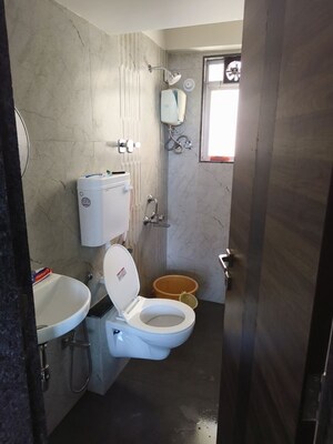 Bathroom in 2 BHK Apartment at Vrindavan Height, Nalasopara East – for Rent