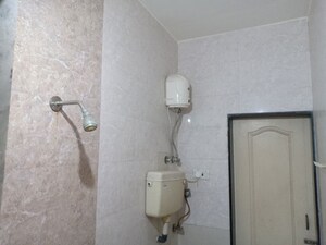 Bathroom in 2 BHK Apartment at Swastik Regalia, Waghbil – for Rent