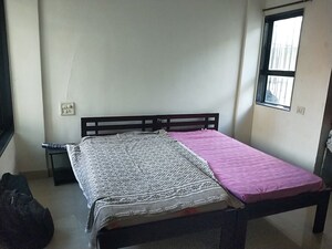 Bedroom in 2 BHK Apartment at Swastik Regalia, Waghbil – for Rent