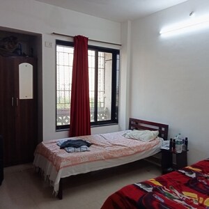 Bedroom in 2 BHK Apartment at Swastik Regalia, Waghbil – for Rent