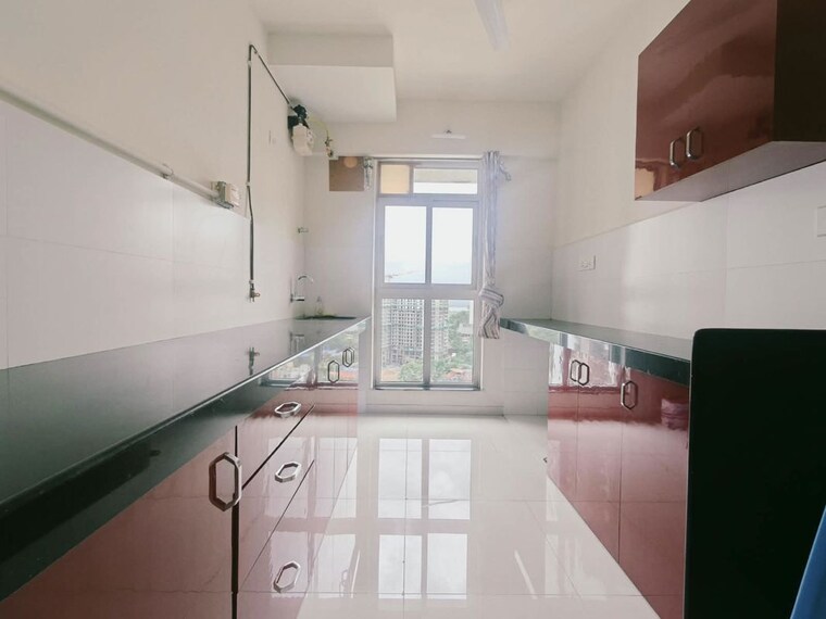 Kitchen, godrej-emerald 2 Bedroom 708 Sq.Ft. Apartment In Ghodbunder Road Thane 10668292