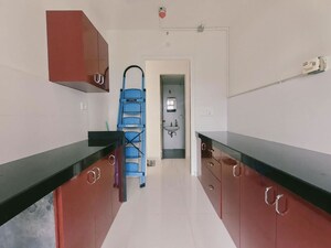 Kitchen in 2 BHK Apartment at Godrej Emerald, Ghodbunder Road – for Rent
