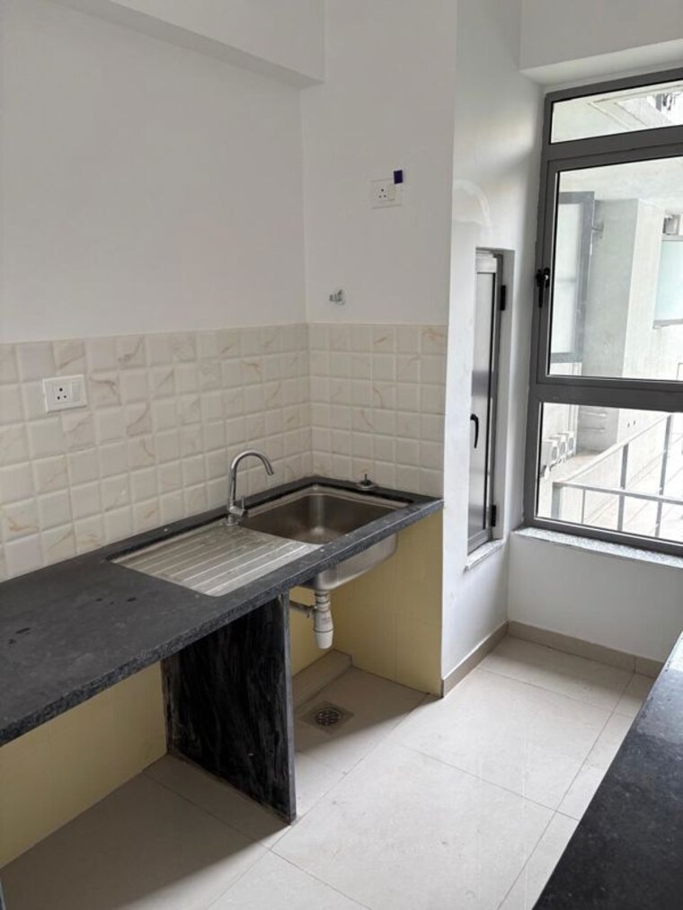 Kitchen, kalpataru-immensa 3 Bedroom 1200 Sq.Ft. Apartment In Kolshet Road Thane 10668375
