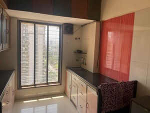 Kitchen in 2 BHK Apartment at Serenity CHS Ltd, Mira Road – for Rent