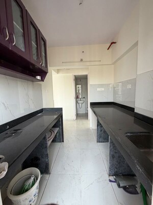 Kitchen in 2 BHK Apartment at Runwal Gardens, Dombivli East – for Rent
