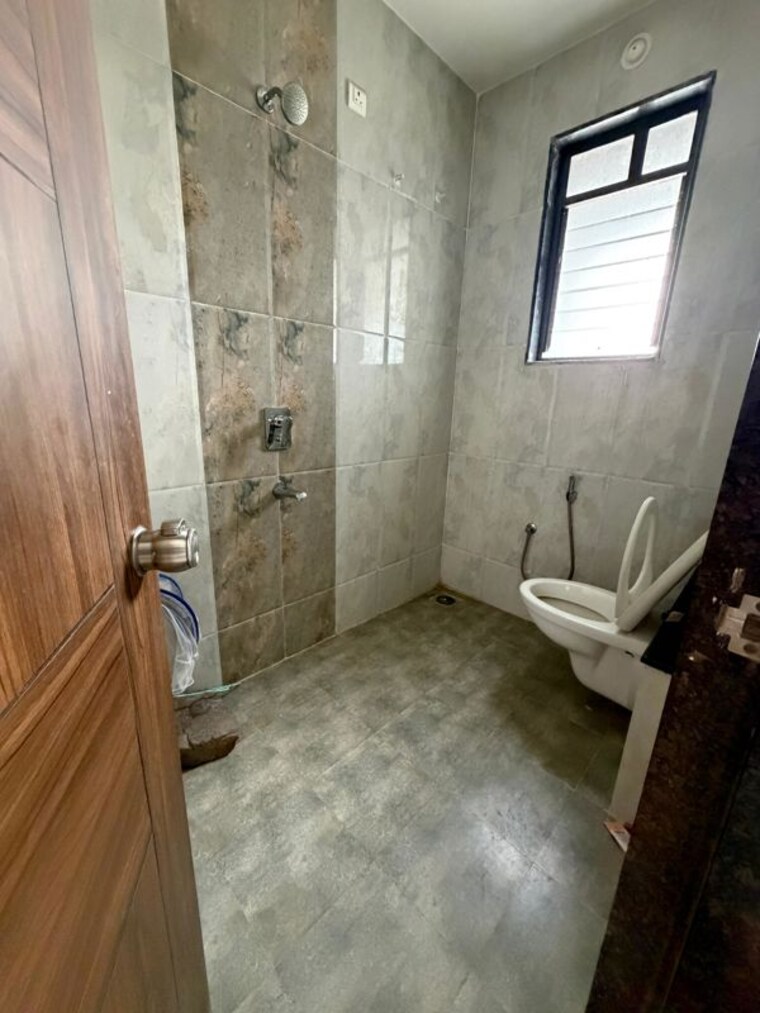 Bathroom, the-creations-gururatna-heritage 2 Bedroom 824 Sq.Ft. Apartment In Baner Pune 10668433
