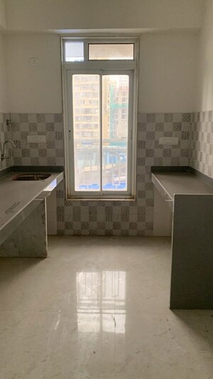 Kitchen in 2 BHK Apartment at ISD Maple Heights, Agripada – for Sale