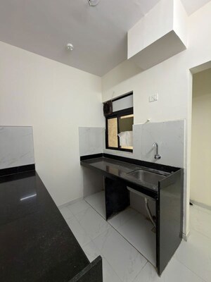 Kitchen in 1 BHK Apartment at Runwal Gardens, Dombivli East – for Rent