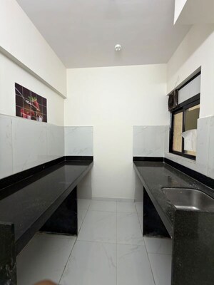 Kitchen in 1 BHK Apartment at Runwal Gardens, Dombivli East – for Rent