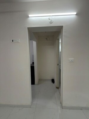 Building Lobby in 1 BHK Apartment at Runwal Gardens, Dombivli East – for Rent