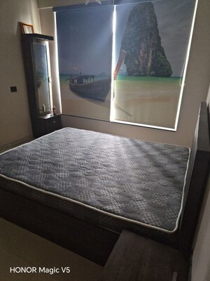 Bedroom in 2 BHK Apartment at Sheth Vasant Lawns, Laxmi Nagar – for Rent