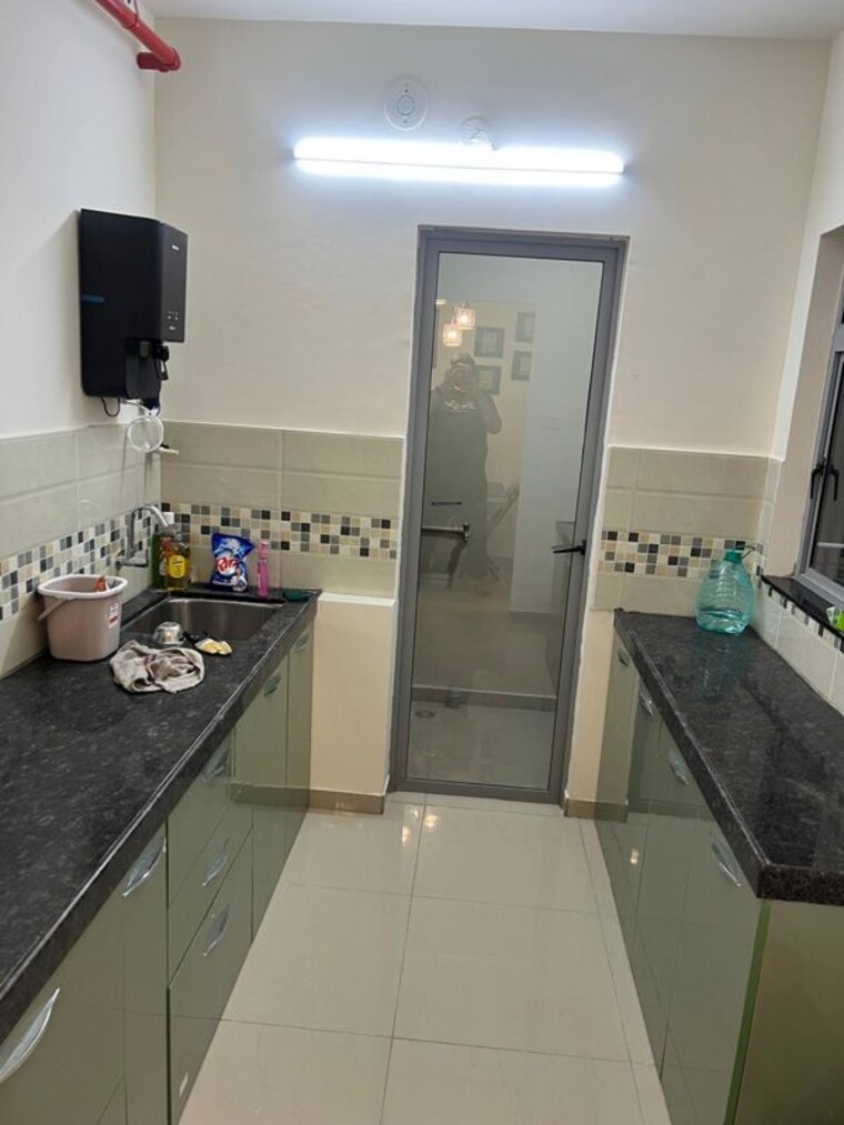 Kitchen, mahindra-happinest-tathawade-phase-1 2 Bedroom 702 Sq.Ft. Apartment In Tathawade Pune 10668506