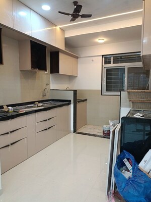 Kitchen in 2 BHK Apartment at Raga Top Towers, Wakad – for Rent
