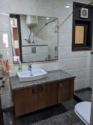 Washroom in 3 BHK Builder Floor at Kalkaji – for Rent
