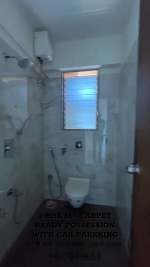 Bathroom in 2 BHK Apartment at Kuber Palace, Dahisar West – for Sale