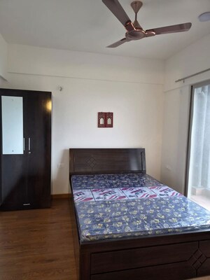 Bedroom in 2 BHK Apartment at Gera Planet Of Joy, Kharadi – for Rent