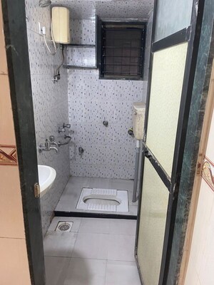Bathroom in 2 BHK Apartment at Big Splash, Vashi Sector 17 – for Rent