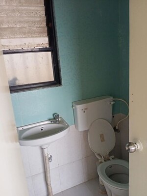 Bathroom in 2 BHK Apartment at Ganesh Nakshatram, Dhayari – for Sale