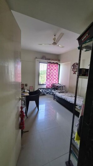 Bedroom in 2 BHK Apartment at Ganesh Nakshatram, Dhayari – for Sale