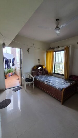 Bedroom in 2 BHK Apartment at Ganesh Nakshatram, Dhayari – for Sale