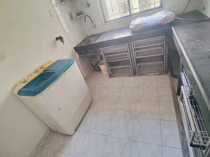 Kitchen in 2 BHK Apartment at Dheeraj Ganga, Malad West – for Rent