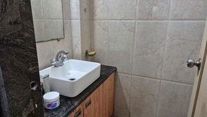 Bathroom in 2 BHK Apartment at Jheel Darshan Apartment, Powai – for Rent