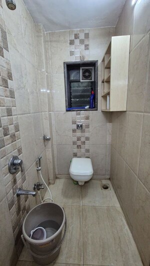 Bathroom in 2 BHK Apartment at Jheel Darshan Apartment, Powai – for Rent