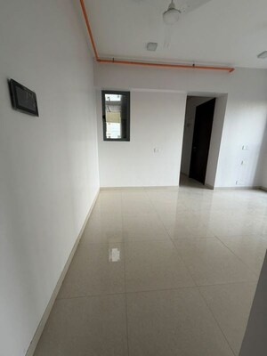 Building Lobby in 1.5 BHK Apartment at Kalpataru Elitus, Mulund West – for Rent
