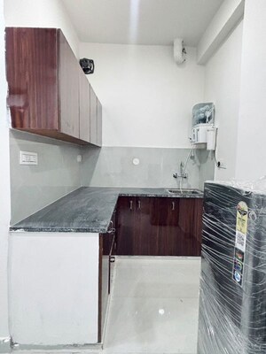Kitchen in 1 BHK Apartment at Centrum Plaza, Sector 53 – for Rent