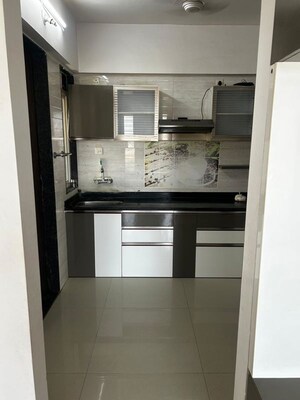 Kitchen in 2 BHK Apartment at Ravinanda Skylights, Wagholi – for Rent