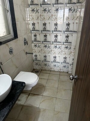 Bathroom in 2 BHK Apartment at Ravinanda Skylights, Wagholi – for Rent
