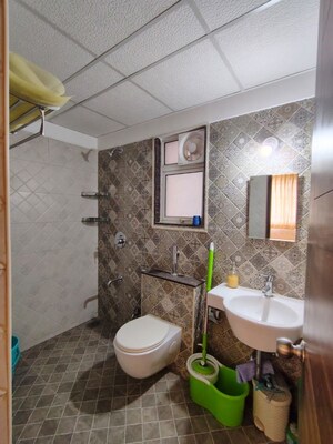 Bathroom in 2 BHK Apartment at Megapolis Symphony, Hinjewadi – for Rent
