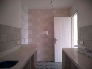 Kitchen in 2.5 BHK Apartment at Neumec Shreeji Towers, Wadala East – for Sale