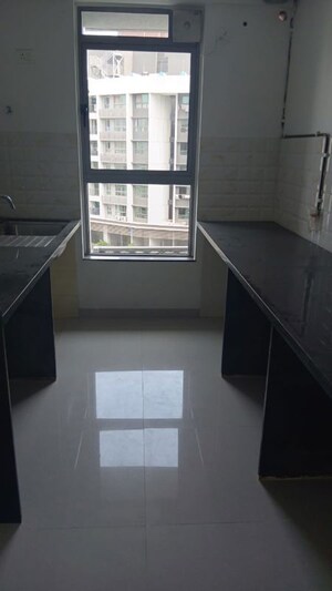 Kitchen in 2 BHK Apartment at Kalpataru Immensa B, Kolshet Road – for Sale