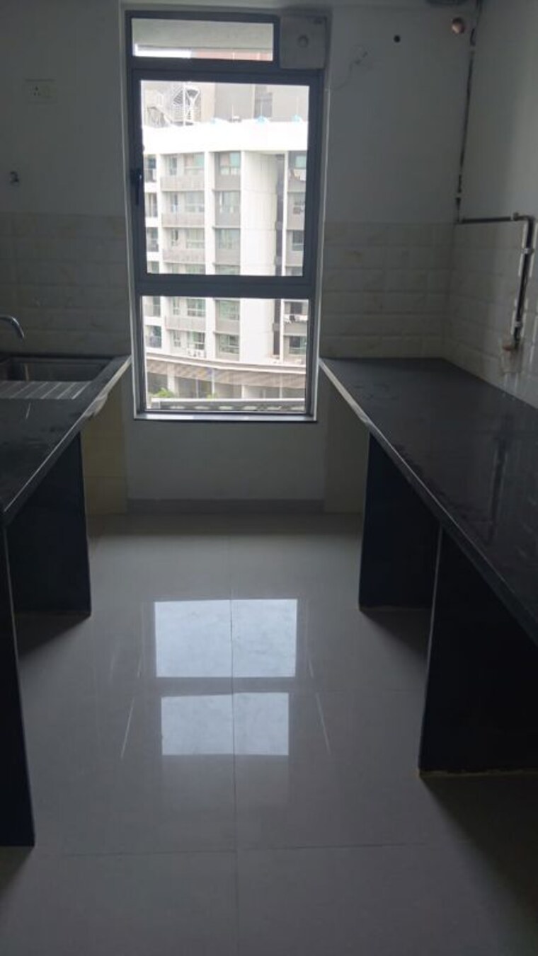 Kitchen, kalpataru-immensa 2 Bedroom 663 Sq.Ft. Apartment In Kolshet Road Thane 10669004