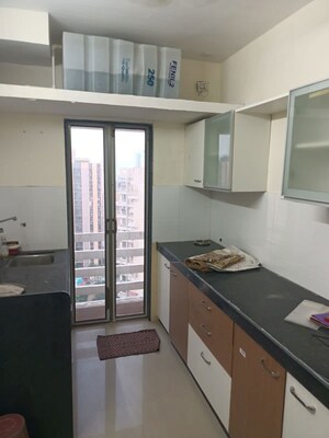 Kitchen in 2 BHK Apartment at Ekta Parks Ville, Virar West – for Rent