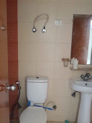 Bathroom in 3 BHK Apartment at Mahagun My Woods, Sector 16c Greater Noida – for Rent