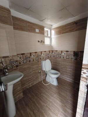 Bathroom in 2 BHK Apartment at Bankey Bihari Aggarwal Heights, Raj Nagar Extension – for Rent