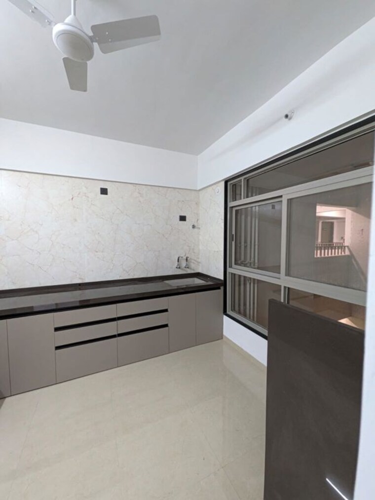 Kitchen, choice-que-914 2.5 Bedroom 850 Sq.Ft. Apartment In Keshav Nagar Pune 10669372