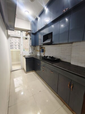Kitchen in 3 BHK Apartment at Windsor Paradise 2, Raj Nagar Extension – for Rent