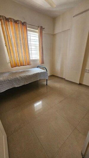 Bedroom in 2 BHK Apartment at Sancheti Eves Garden, Mundhwa – for Rent