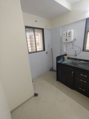 Kitchen in 2 BHK Apartment at Amit Astonia Classic, Undri – for Rent