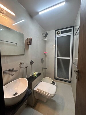 Bathroom in 2 BHK Apartment at Malhar 24 East, Sanpada – for Rent
