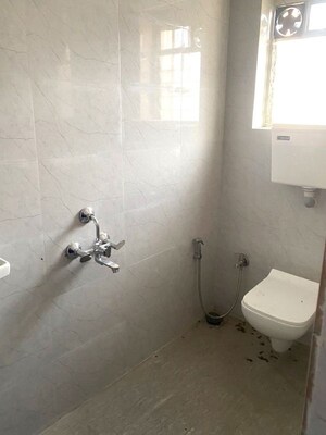 Bathroom in 2 BHK Apartment at Kalumal Estate, Juhu – for Rent