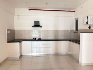 Kitchen in 4 BHK Apartment at Gera World of Joy, Kharadi – for Rent