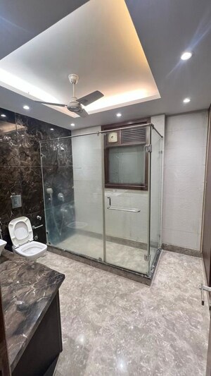 Bathroom in 4 BHK Apartment at Greater Kailash I – for Rent