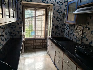 Kitchen in 2 BHK Apartment at Harbour Court, Nerul Sector 19a – for Rent