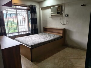 Bedroom in 2 BHK Apartment at Harbour Court, Nerul Sector 19a – for Rent