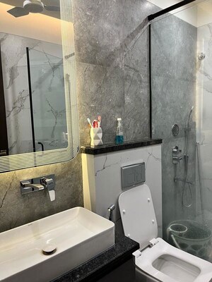 Bathroom in 2.5 BHK Builder Floor at Smart World Orchard, Sector 61 – for Rent